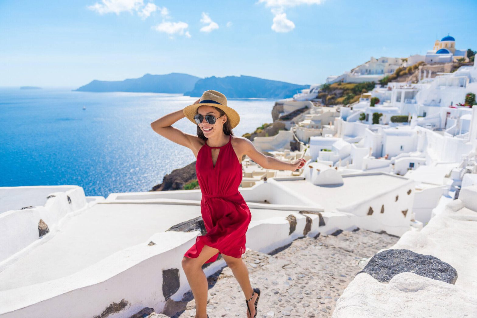 Travel Tourist Happy Woman Running Stairs on a Greek Island