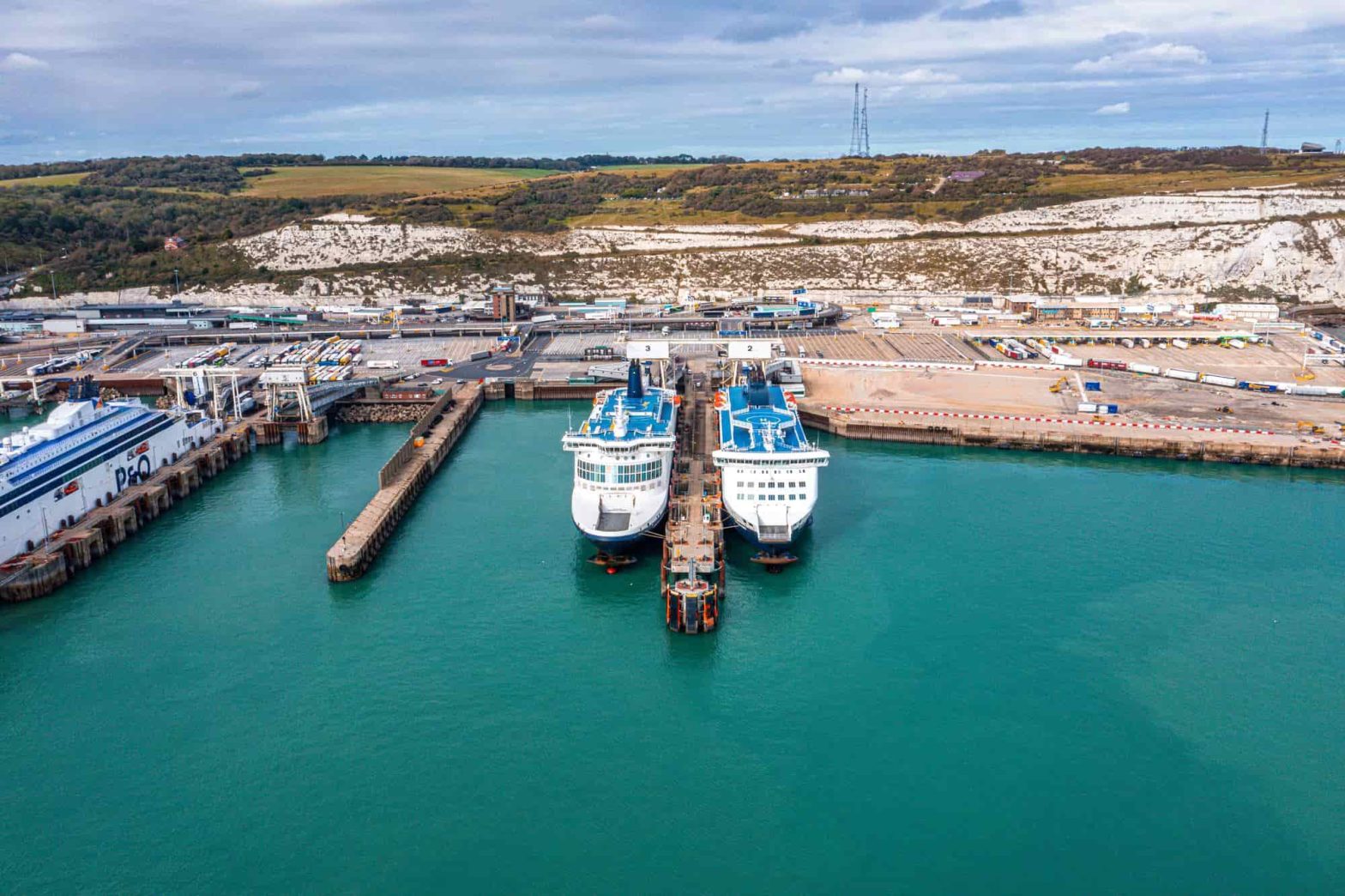 Aerial view of the Dover harbor with many ferries
