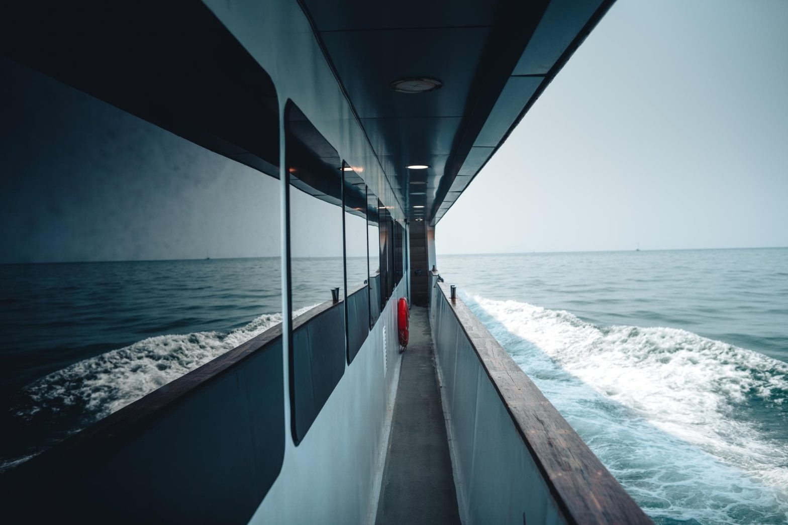 Exterior side of a ferry cruising over a calm sea